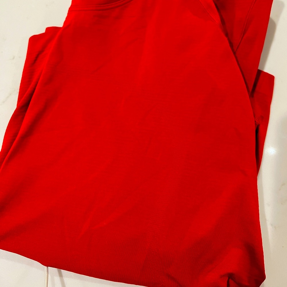 lululemon red size 6 long sleeve swiftly tech (hip length). EUC
